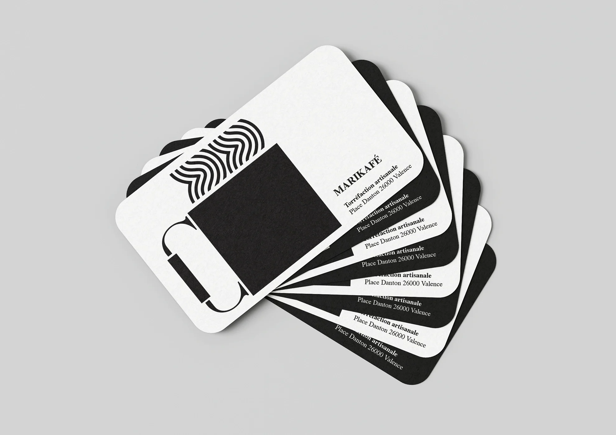 Fan-shaped business cards for the graphic identity of a coffee brand