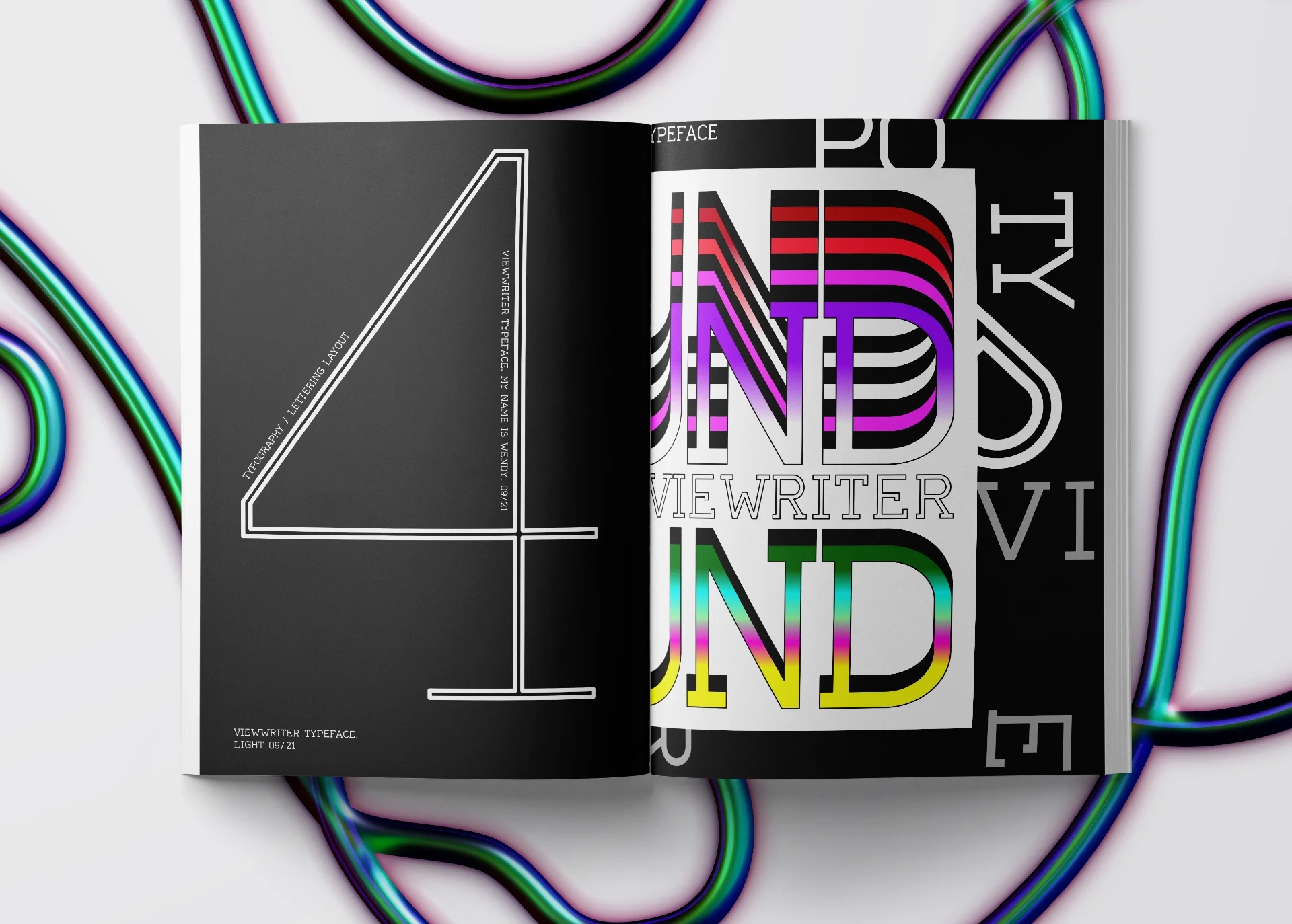 displayfont-typographer-graphicdesign Layout of a book on a black background with numbers and letters