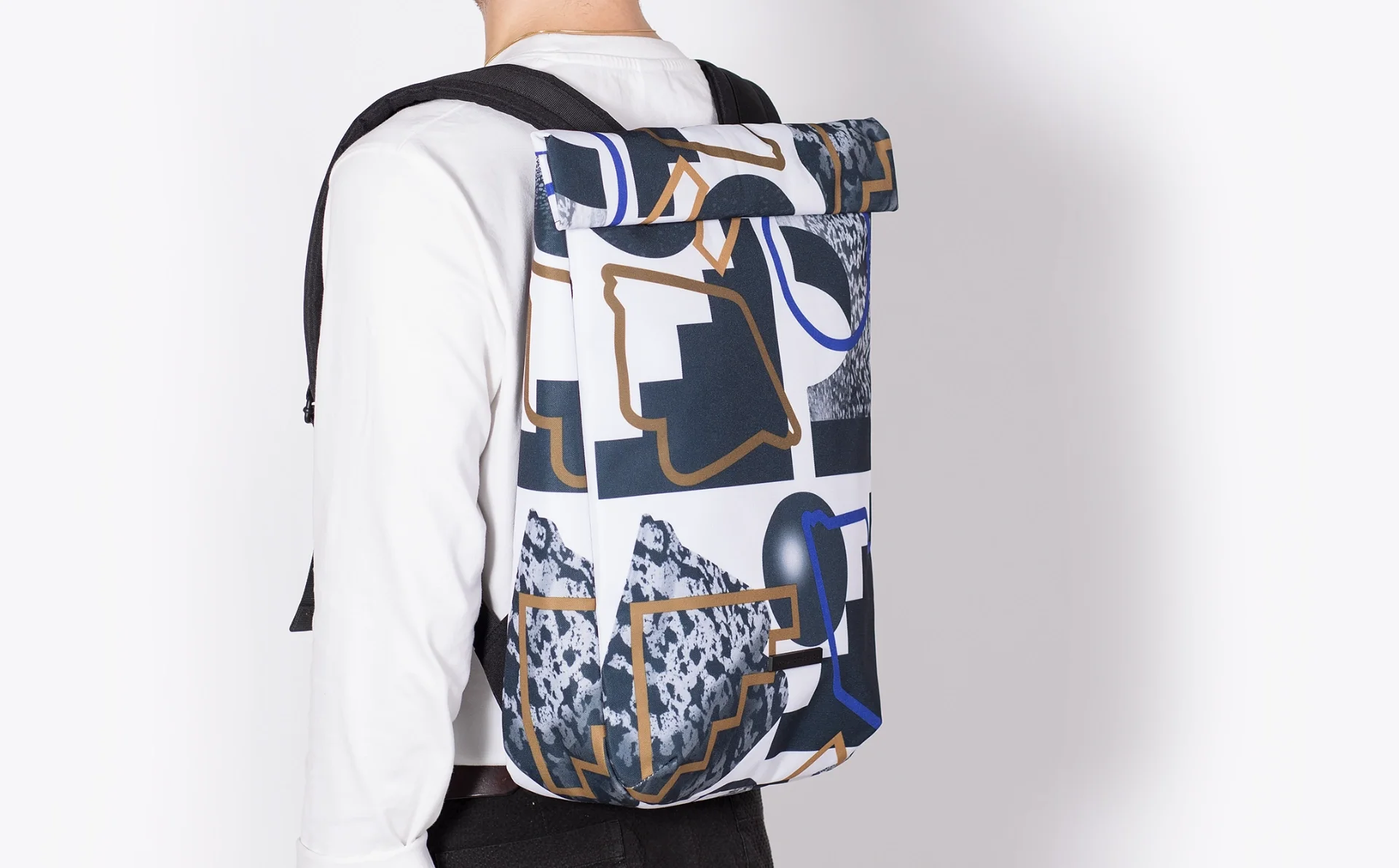 Model presenting the graphic backpack signed My Name is Wendy for the brand Ucon Acrobatics