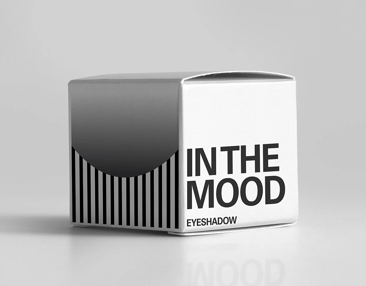 Packaging design for the green eyeshadow with a graphic icon and the logo of the brand