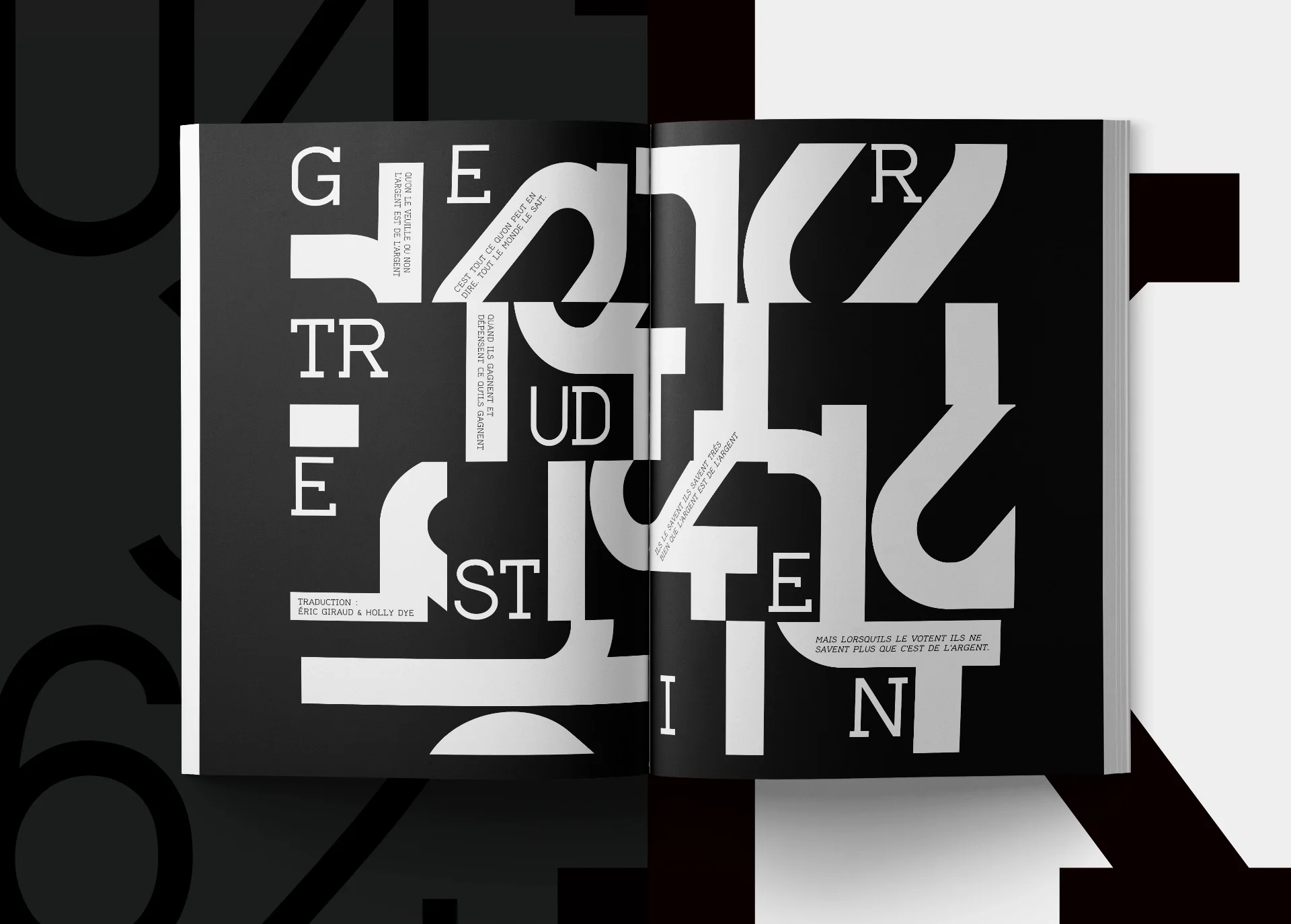 Open book with a layout made of lettering and graphic titles