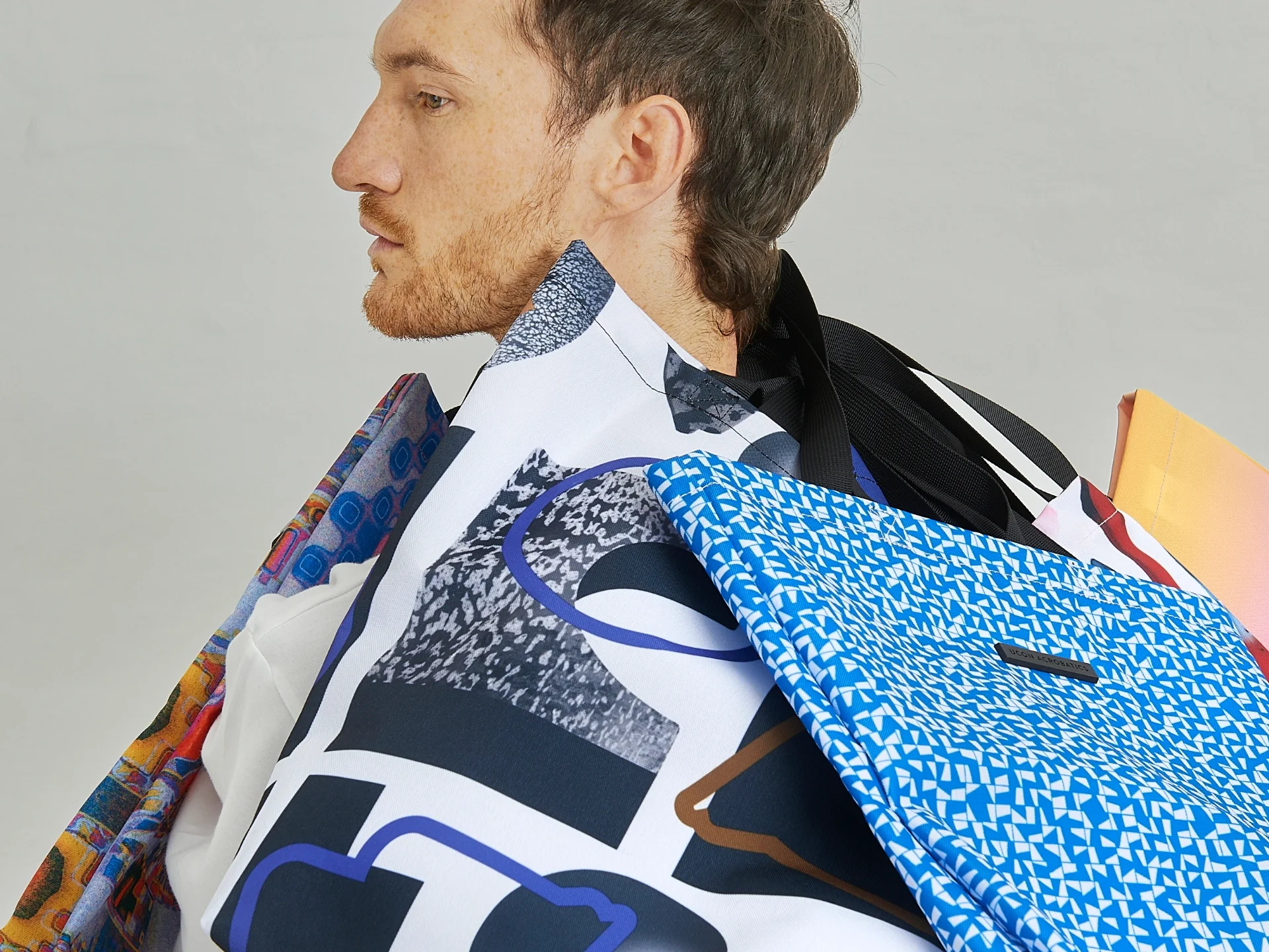 Model wearing a fashion design bag with a graphic design created by My Name is Wendy